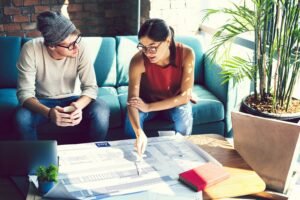 coworkers working project design office Ally Bohanan Real Estate | Luxury Real Estate in Gastonia, NC